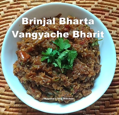 Baigan ka bharta or baigan bharta is a roasted eggplant recipe with onion and tomatoes from India. It is also called Vangyache bharit in Marathi. Cooking eggplant Indian way.